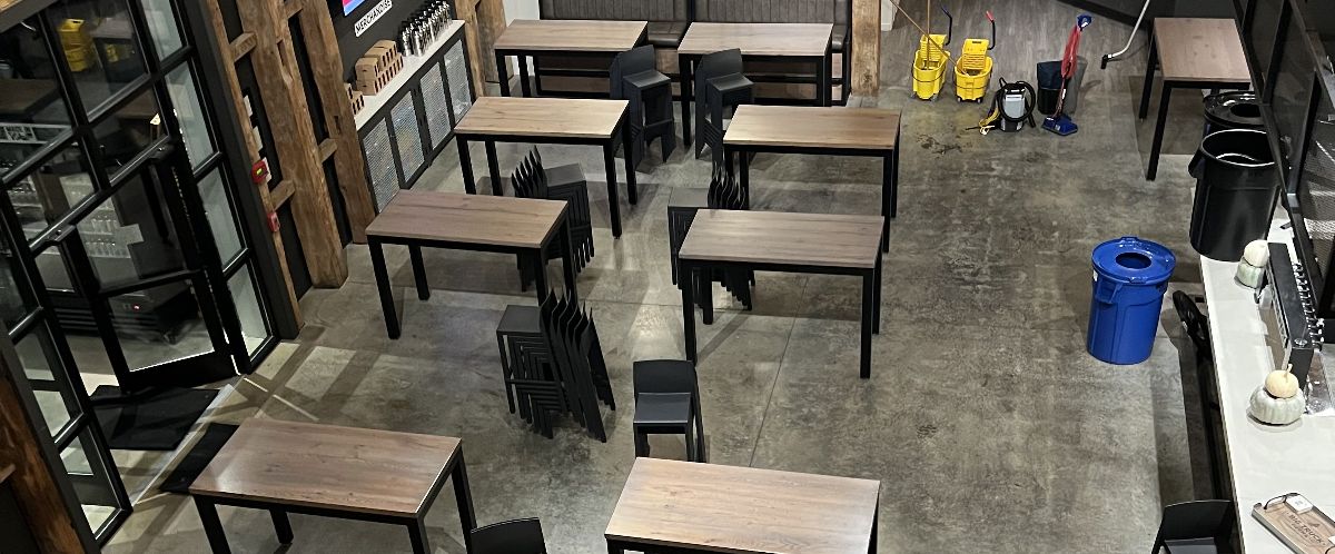 Restaurant seating area that needs cleaning