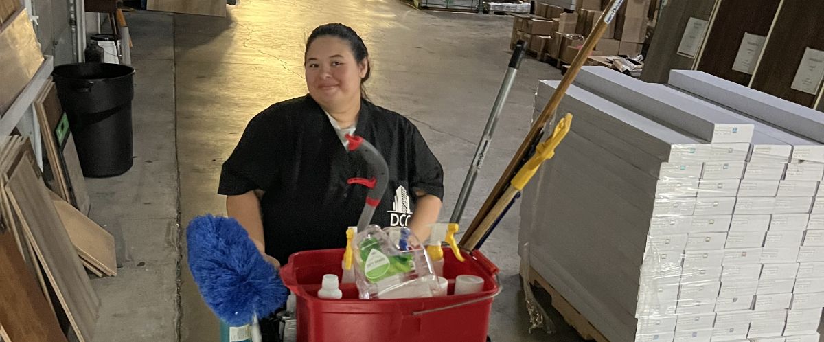 DCC staff cleaning warehouse